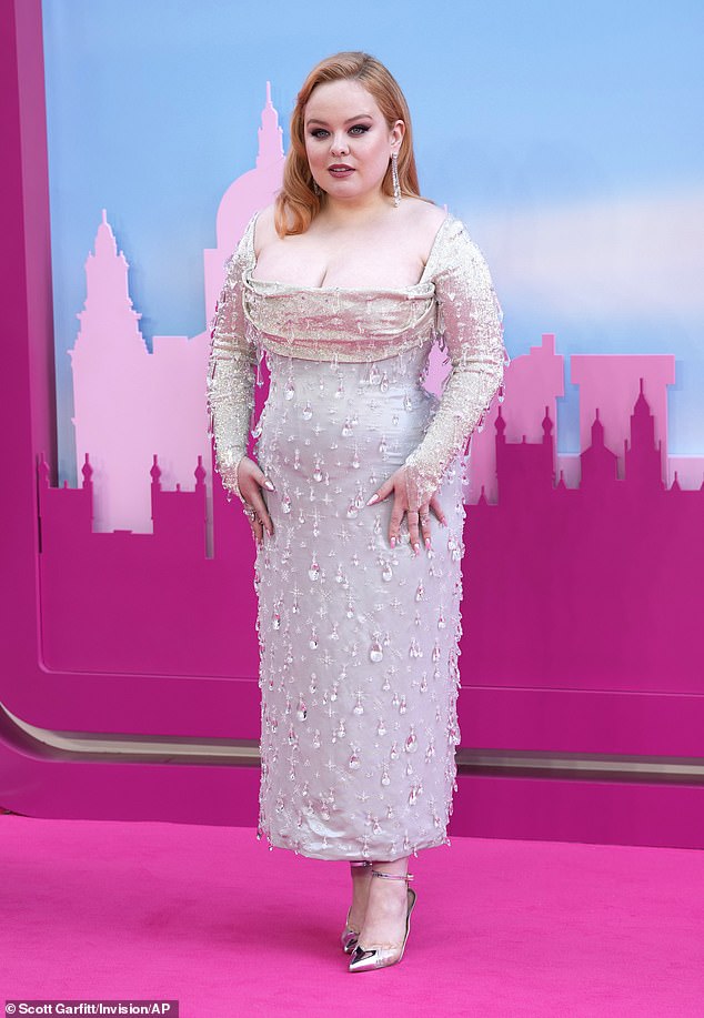Sparkling: Nicola Coughlan, 36, put on a dazzling display in a stunning silver satin dress which had a sparkling bodice and droplet glass jewels stitched all across it