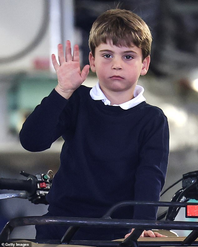 Louis, the youngest member of the family aged five, was unhappy that he couldn't join them despite practising being a ballboy this year (pictured on Friday)