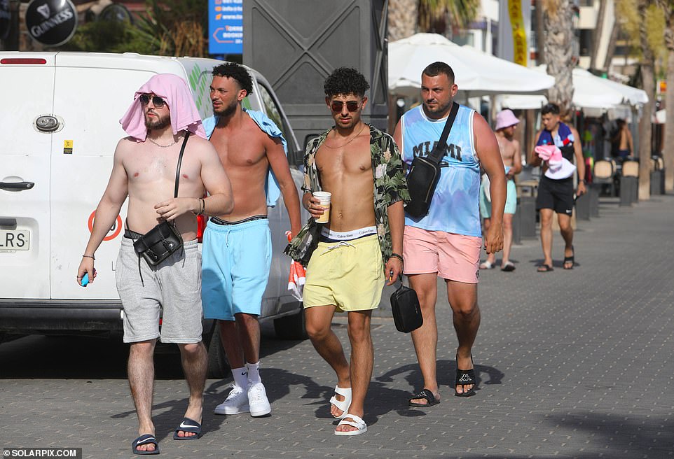 British tourists are revelling in the heat in Benidorm, Spain, on Monday