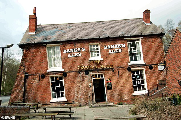 The Crooked House, in Himley, Dudley, West Midlands, is dubbed Britain's wonkiest pub. It is pictured before last night's fire