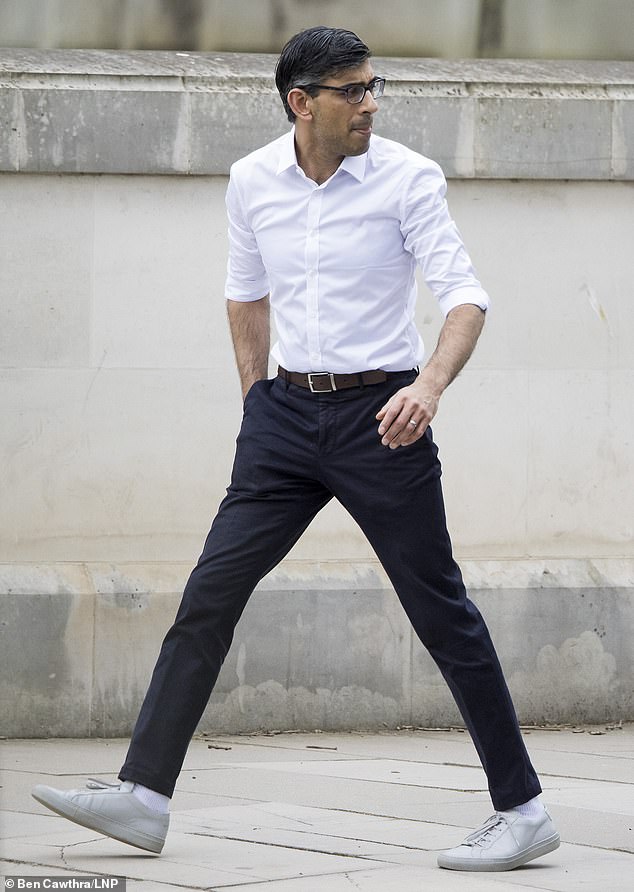 Mr Sunak showing off a more casual ensemble outside Downing Street last year