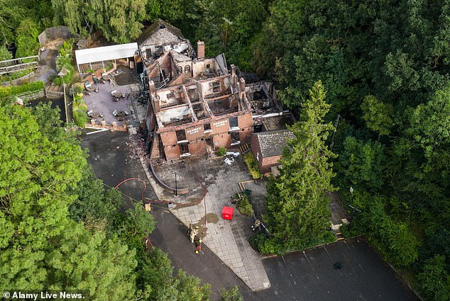 The Crooked House pub was set alight last night. West Midlands and Staffordshire Fire and Rescue Service were called at 10pm. The remains of the pub are pictured today