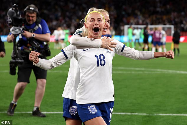 England's Chloe Kelly and Alex Greenwood celebrate victory following a penalty shoot-out after extra time, which saw Kelly scoring the goal that sent the Lionesses through