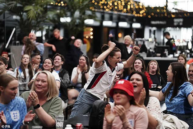 Supporters leapt for joy as they watched Kelly score the winning goal for England