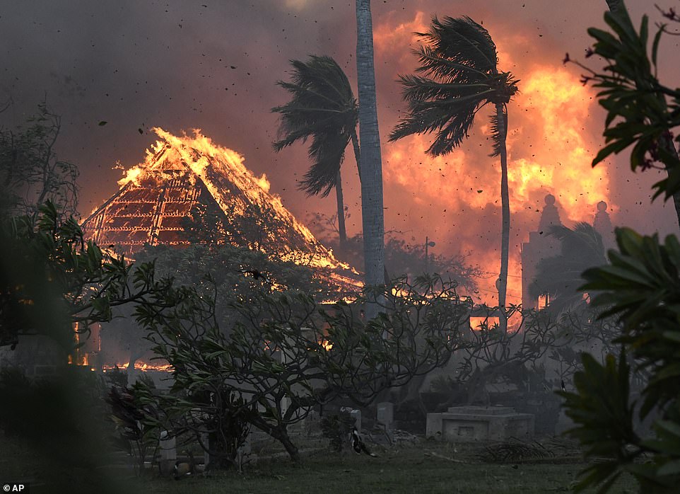 The hall of historic Waiola Church in Lahaina and nearby Lahaina Hongwanji Mission are engulfed in flames along Wainee Street