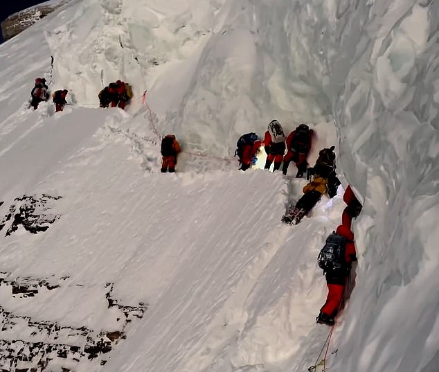 Instead of helping him, his fellow climbers went up the side of the mountain past him without offering any help