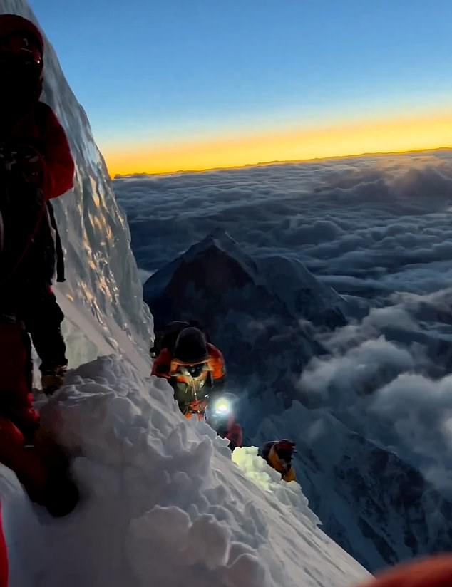 The video shows clouds several thousand feet below them, revealing just how high they were when the footage was taken