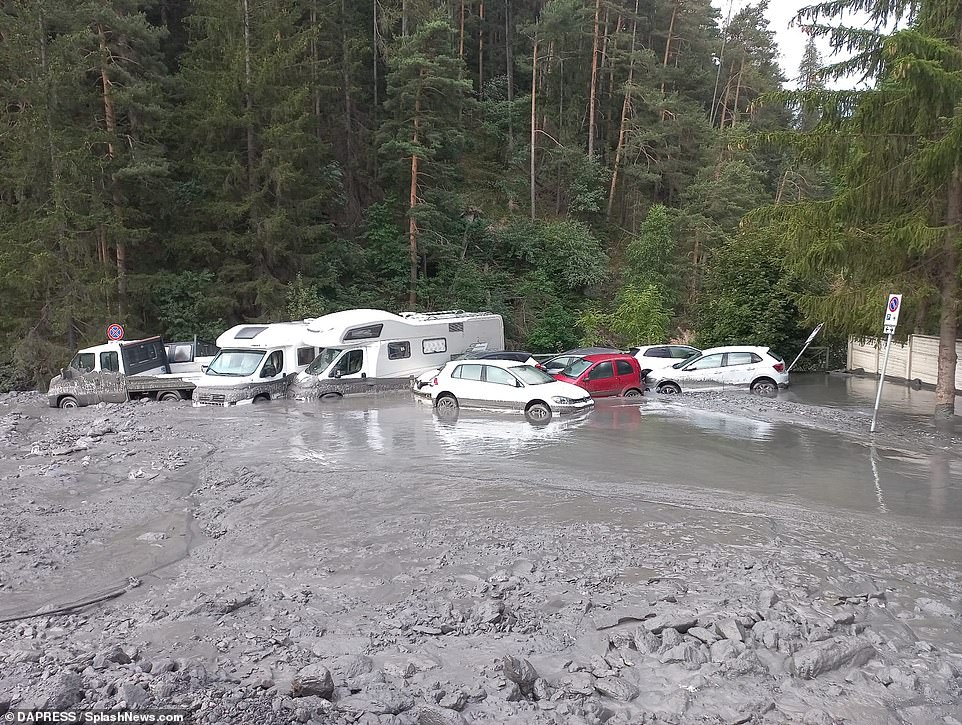 Cars and campervans were damaged in the mudslide in Bardonecchia on Sunday