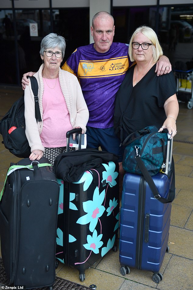 The Rowley family from Rochdale (left to right: barbara, Chris and his wife Kirstie) also had their flights cancelled today