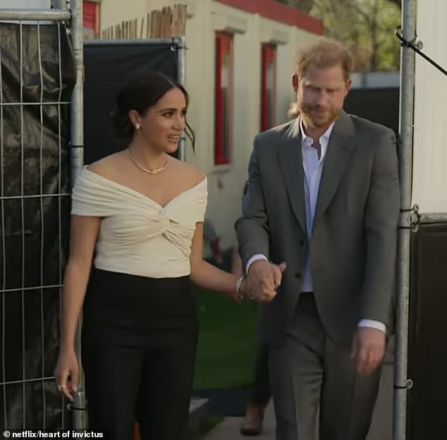 Meanwhile there are also shots of the couple backstage at the games as they join a group therapy session
