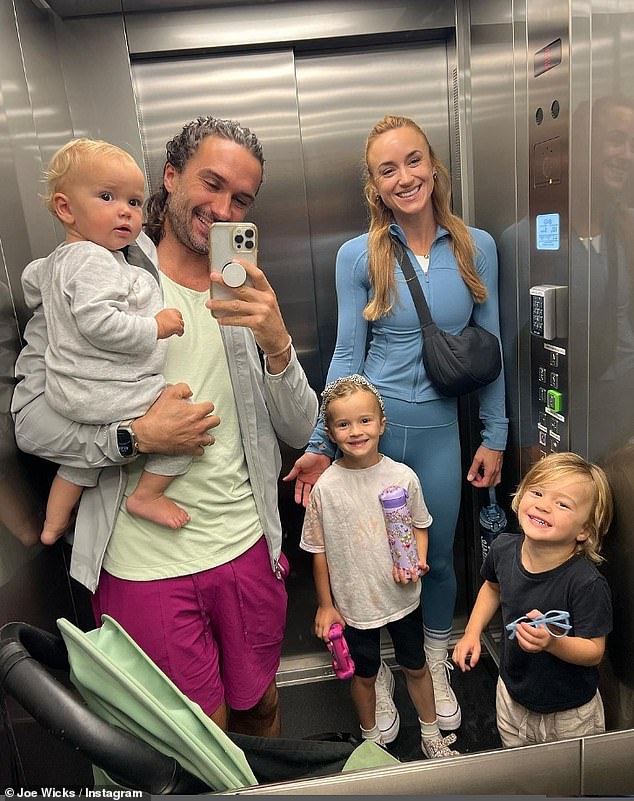 Family time: 'I just love being with my kids,' he has told The Times . 'It's not a permanent thing, but we want to have another year together' (pictured with wife Rosie and their children)