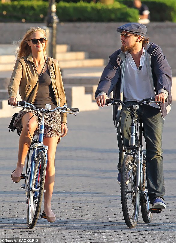 Brief: The Victoria's Secret Angel alum was just 22 when she dated DiCaprio in 2012 (pictured on a bike ride in June 14 in NYC)
