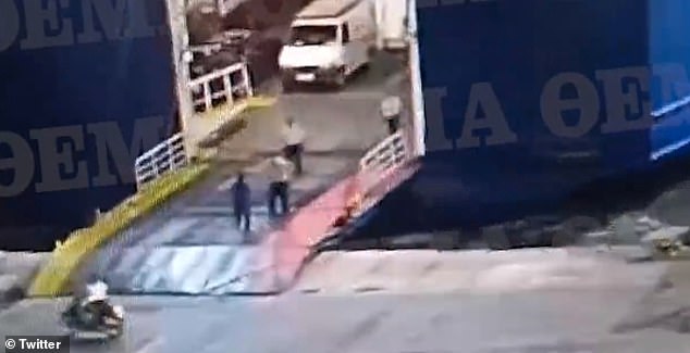 Several crew appear to confront the man on the ferry ramp just as the vessel leaves Piraeus