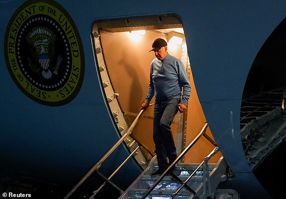 U.S. President Joe Biden deboards at Joint Base Andrews, following his visit to Israel, amid the ongoing conflict between Israel and Hamas, in Maryland, U.S. October 19, 2023. REUTERS/Evelyn Hockstein
