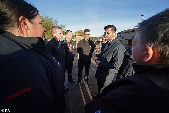 First Minister Humza Yousaf (2nd right) during a visit to Brechin, Scotland, to thank members of the emergency services and Angus Council for their efforts in responding to the flooding caused by Storm Babet. Picture date: Monday October 23, 2023. PA Photo. See PA story WEATHER Babet. Picture credit should read: Andrew Milligan/PA Wire