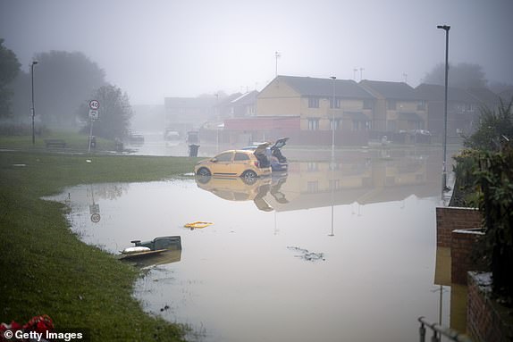 ROTHERHAM, UNITED KINGDOM - OCTOBER 23: Flood waters begin to recede in the village of Catcliffe after Storm Babet flooded homes, business and roads on October 23, 2023 in Rotherham, United Kingdom. The UK Environment Agency has warned that flooding could last for days in the wake of Storm Babet with 116 flood warnings remaining in place across England. (Photo by Christopher Furlong/Getty Images)