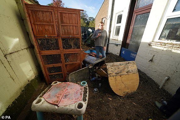 Kim Clark in the garden of her flood damaged home in River Street after a visit by First Minister Humza Yousaf to Brechin, Scotland, where he met locals and  thanked members of the emergency services and Angus Council for their efforts in responding to the flooding caused by Storm Babet. Picture date: Monday October 23, 2023. PA Photo. See PA story WEATHER Babet. Picture credit should read: Andrew Milligan/PA Wire