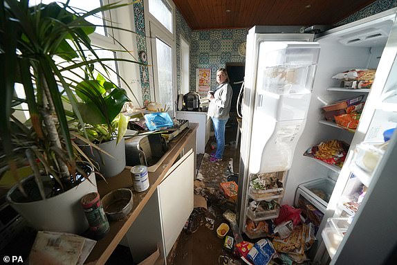 Kim Clark inside her flood damaged home in River Street after a visit by First Minister Humza Yousaf to Brechin, Scotland, where he met locals and  thanked members of the emergency services and Angus Council for their efforts in responding to the flooding caused by Storm Babet. Picture date: Monday October 23, 2023. PA Photo. See PA story WEATHER Babet. Picture credit should read: Andrew Milligan/PA Wire