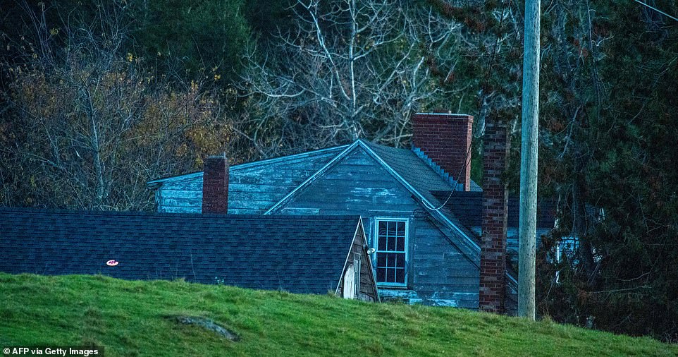 The FBI on Thursday night were shining a light on this window, on the upper floor of a home believed to belong to either Card's parents or brother and sister-in-law