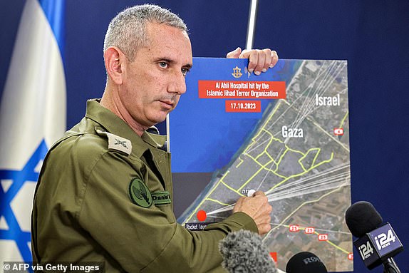 (FILES) Israeli army spokesman Daniel Hagari speaks to the press from The Kirya, which houses the Israeli Ministry of Defence in Tel Aviv on October 18, 2023. Every evening since Hamas attacked southern Israel on October 7, Rear Admiral Hagari appears on Israeli television: the commando-turned-communicator is the face of the war in Gaza. (Photo by GIL COHEN-MAGEN / AFP) (Photo by GIL COHEN-MAGEN/AFP via Getty Images)