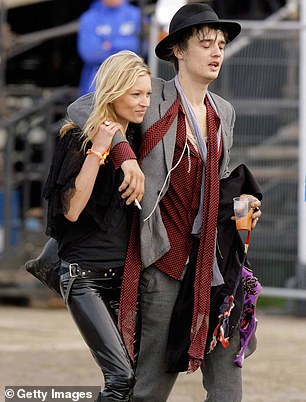Kate Moss and Pete Doherty back stage at Glastonbury in 2007
