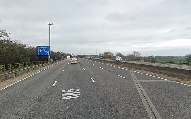 The management consultant had been driving between Junction 6 and 5 on the northbound of the M5 (pictured) at 6.45pm on September 8