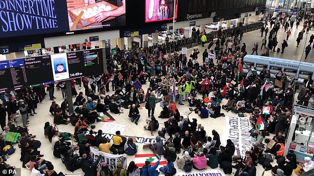 OCTOBER 28: A sit-in pro-Palestine protest at London Liverpool Street station