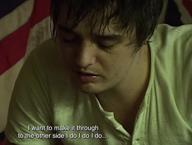 Tough: He looked pained in the scenes as he was filmed by his wife