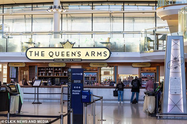 Pit stop: Nigel stopped for a pint at The Queen's Arms before boarding his 24-hour flight