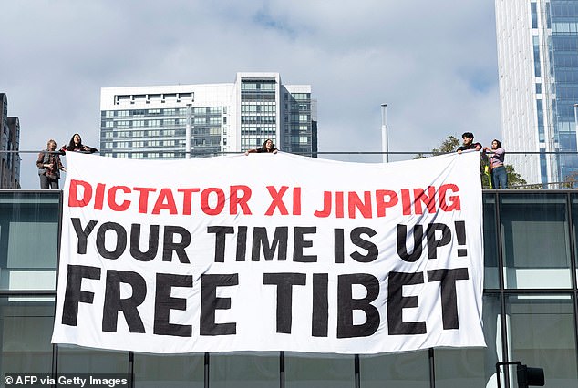Some protesters blasted Xi as a dictator and demanded he free Tibet, adding 'your time is up!'