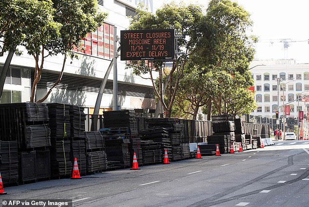 A sign signals road closures as security preparations are under way at the Asia-Pacific Economic Cooperation (APEC) summit