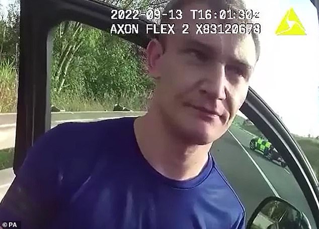 Peers after being arrested by Merseyside Police by the side of a motorway
