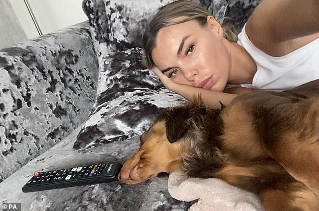 A family photo of Ashley Dale with her dachshund Darla