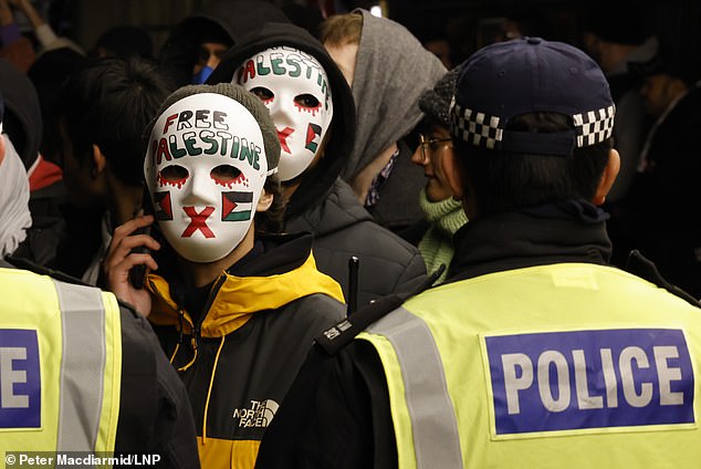 Police closed off Whitehall near Trafalgar Square as Pro-Palestine protesters gathered after an earlier march ended