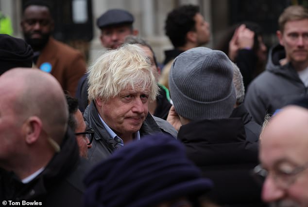 The former Prime Minister was also joined by his sister Rachel in the march organised by the Campaign Against Antisemitism, which began by the Royal Courts of Justice