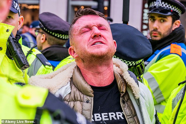 Mr Robinson claimed to be there 'as a journalist' and alleged police were trying to stop him 'from reporting'. The Met Police said this did not play a factor