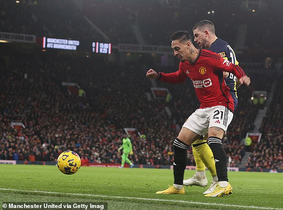 MANCHESTER, ENGLAND - DECEMBER 09: Antony of Manchester United in action with Ryan Christie of AFC Bournemouth during the Premier League match between Manchester United and AFC Bournemouth at Old Trafford on December 09, 2023 in Manchester, England. (Photo by Matthew Peters/Manchester United via Getty Images)