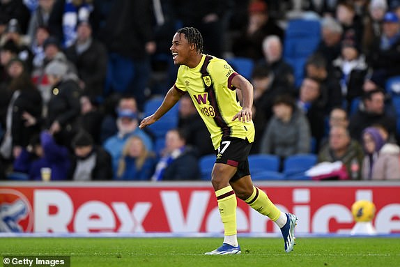BRIGHTON, ENGLAND - DECEMBER 09: Wilson Odobert of Burnley celebrates scoring their team's first goal during the Premier League match between Brighton & Hove Albion and Burnley FC at American Express Community Stadium on December 09, 2023 in Brighton, England. (Photo by Mike Hewitt/Getty Images)