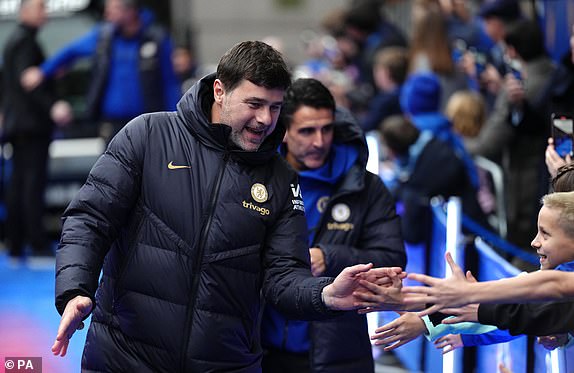 Chelsea manager Mauricio Pochettino greets fans prior to the Premier League match at Stamford Bridge, London. Picture date: Saturday December 16, 2023. PA Photo. See PA story SOCCER Chelsea. Photo credit should read: John Walton/PA WireRESTRICTIONS: EDITORIAL USE ONLY No use with unauthorised audio, video, data, fixture lists, club/league logos or "live" services. Online in-match use limited to 120 images, no video emulation. No use in betting, games or single club/league/player publications.