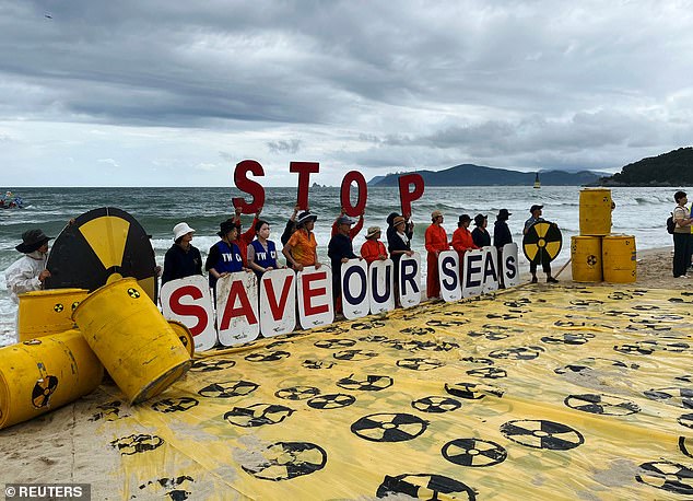 Activists take part in a protest against Japan releasing treated radioactive water from the wrecked Fukushima nuclear power plant in Busan, South Korea