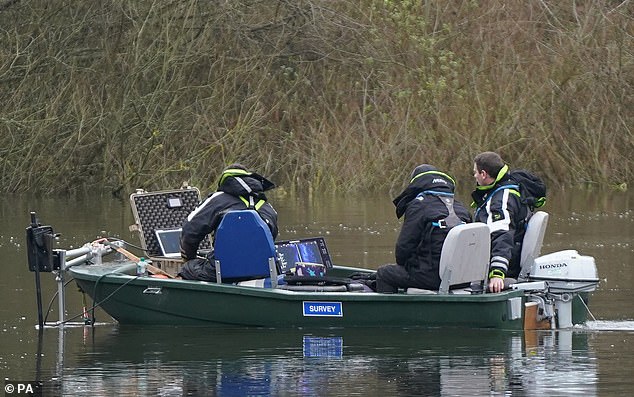 Police search teams on the River Wensum in Wensum Park, Norwich, on December 8