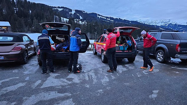 The instructor, who was the only skier wearing an avalanche victim detector, was found unharmed despite being completely buried with the two deceased Brits. Pictured: The rescuers