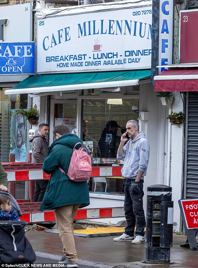 Littler is spotted walking into the north London cafe with a cap on as his girlfriend and manager walk in behind