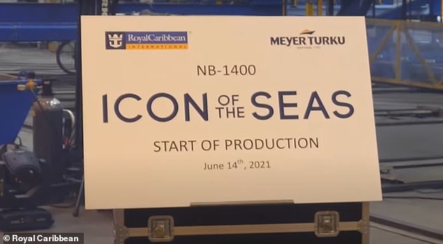 A sign marks the beginning of the 900-day build process