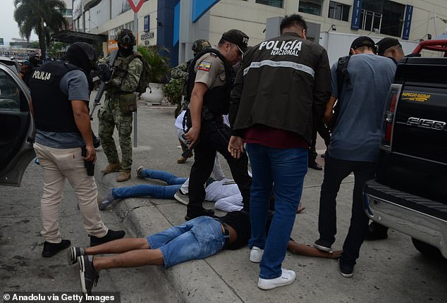 Ecuadorian police arrest several armed men who broke into the set of a public television channel on Tuesday