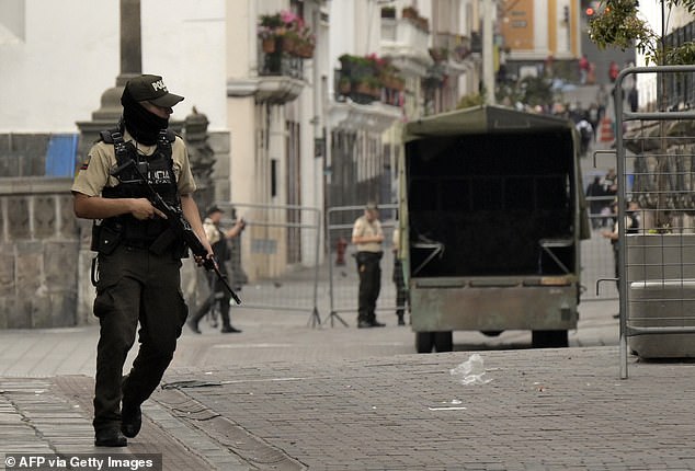 Ecuadorean security forces patrol the area around the main square and presidential palace after Ecuadorean President Daniel Noboa declared the country in a state of emergency on Tuesday