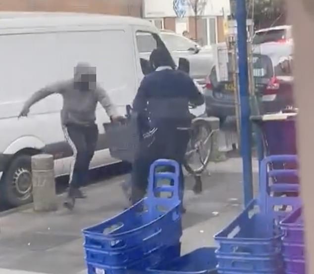 Officers say the incident is being treated as a 'hate crime' - as they pay tribute to the members of the public who 'bravely intervened'