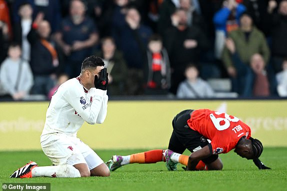 LUTON, ENGLAND - FEBRUARY 18: Casemiro of Manchester United reacts after being shown a yellow card for fouling Amari'i Bell of Luton Town during the Premier League match between Luton Town and Manchester United at Kenilworth Road on February 18, 2024 in Luton, England. (Photo by Shaun Botterill/Getty Images)