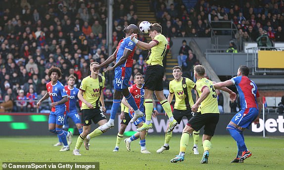 LONDON, ENGLAND - FEBRUARY 24: Burnley's Sander Berge heads clear from Crystal Palace's Jean-Philippe Mateta during the Premier League match between Crystal Palace and Burnley FC at Selhurst Park on February 24, 2024 in London, United Kingdom. (Photo by Rob Newell - CameraSport via Getty Images)