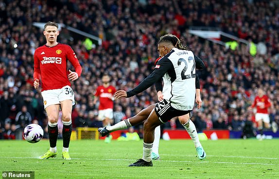 Soccer Football - Premier League - Manchester United v Fulham - Old Trafford, Manchester, Britain - February 24, 2024 Fulham's Alex Iwobi scores their second goal REUTERS/Carl Recine NO USE WITH UNAUTHORIZED AUDIO, VIDEO, DATA, FIXTURE LISTS, CLUB/LEAGUE LOGOS OR 'LIVE' SERVICES. ONLINE IN-MATCH USE LIMITED TO 45 IMAGES, NO VIDEO EMULATION. NO USE IN BETTING, GAMES OR SINGLE CLUB/LEAGUE/PLAYER PUBLICATIONS.